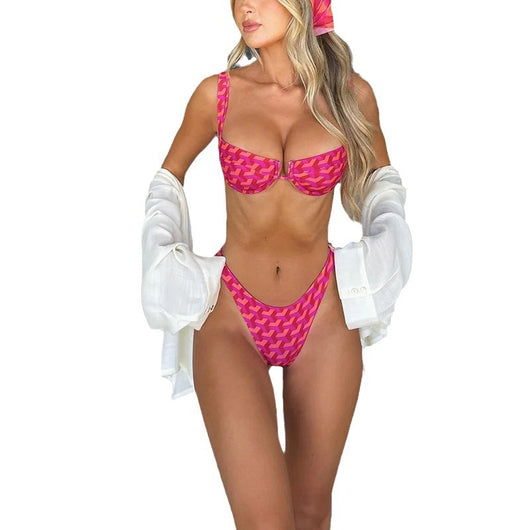 Women's pink and red geometric print bikini with underwire top and high-cut bottoms, styled with a white shirt. - Image 5