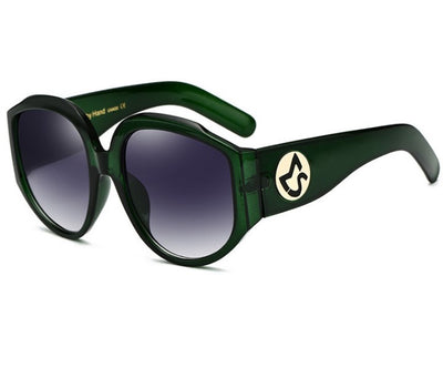 Oversize round sunglasses for women with olive frames, dark gradient lenses, and a gold emblem on the temples. - Image 8