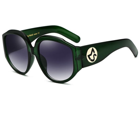 Oversize round sunglasses for women with olive frames, dark gradient lenses, and a gold emblem on the temples. - Image 8