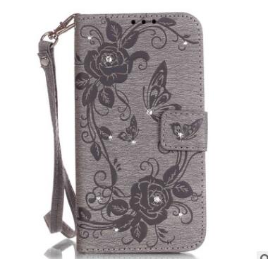 Funda Flip con Mariposa en Relieve para iPhone 7 y Galaxy S7 con Compartimentos para Tarjetas