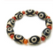 Pulsera de Ágata Roja con Cuenta Dzi de Tres Ojos