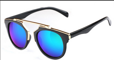 Black cat-eye sunglasses with gold accents and orange-yellow mirrored lenses on a white background. - Image 4