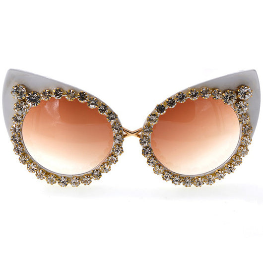 White cat-eye sunglasses with brown gradient lenses, adorned with clear and amber rhinestone flowers and bees. - Image 8
