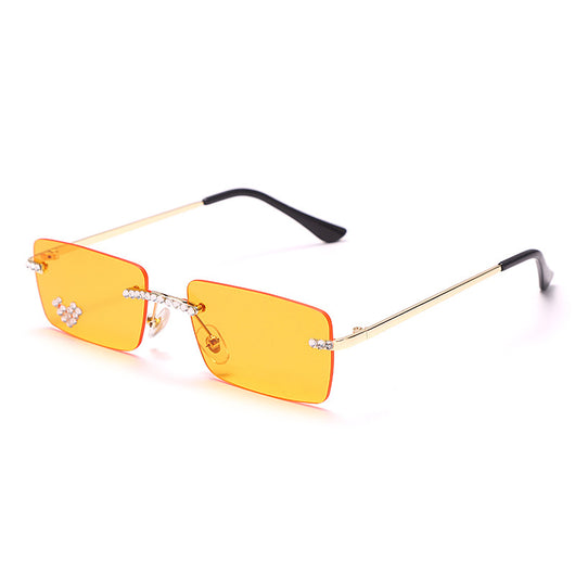 Frameless rectangular sunglasses with pink gradient lenses, gold-tone metal arms, and rhinestone embellishments. - Image 5