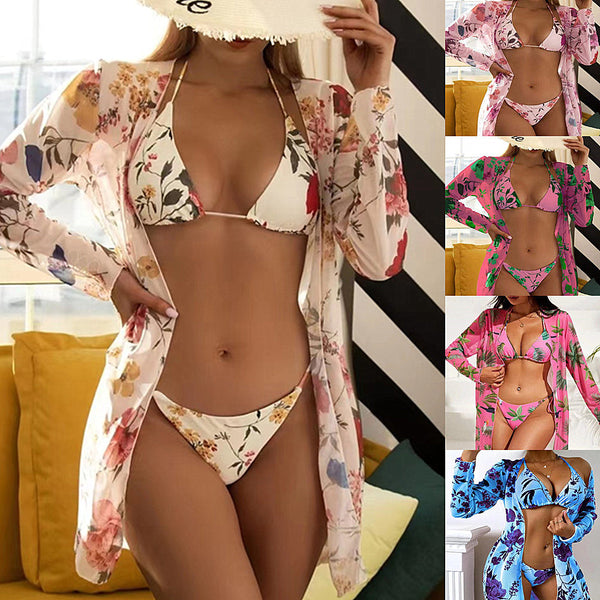 Milky white floral print three-piece swimsuit with triangle bikini top, v-cut bottom, and sheer long-sleeve cover-up.