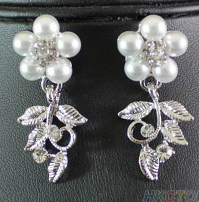 Silver-tone bridal necklace and earring set with white pearls and clear rhinestones in a floral leaf design. - Image 2