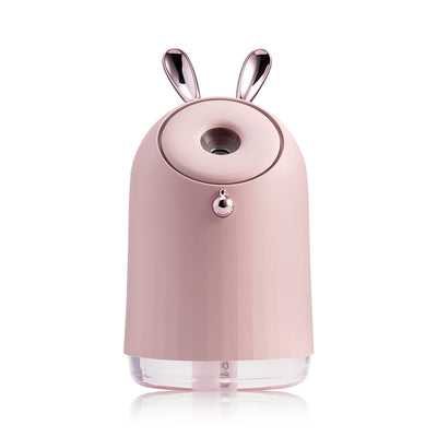 Grey humidifier table lamp with a clear base and decorative silver ears, featuring a mist outlet and control button. - Image 5