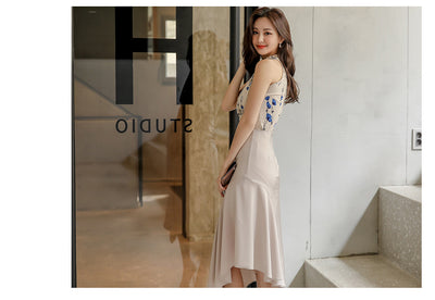 Conjunto Elegante: Blusa Sin Mangas Estampada y Falda Tableada con Abertura - Image 10