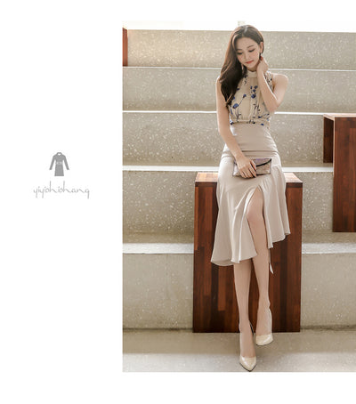 Conjunto Elegante: Blusa Sin Mangas Estampada y Falda Tableada con Abertura - Image 12