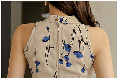 Conjunto Elegante: Blusa Sin Mangas Estampada y Falda Tableada con Abertura - Image 18