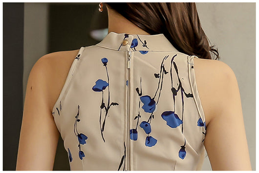 Conjunto Elegante: Blusa Sin Mangas Estampada y Falda Tableada con Abertura - Image 18