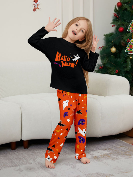 Family of four wearing matching black and orange Halloween long-sleeve pajamas with ghost and bat prints. - Image 13