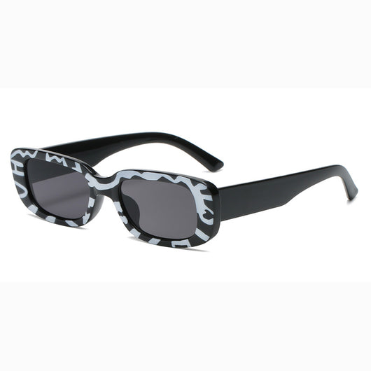 Rectangular tortoiseshell sunglasses with a small frame and dark gray lenses, angled on a white background. - Image 20