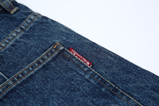 Jeans Vintage Deconstruido con Parches Pesados Lavado Retro - Image 39