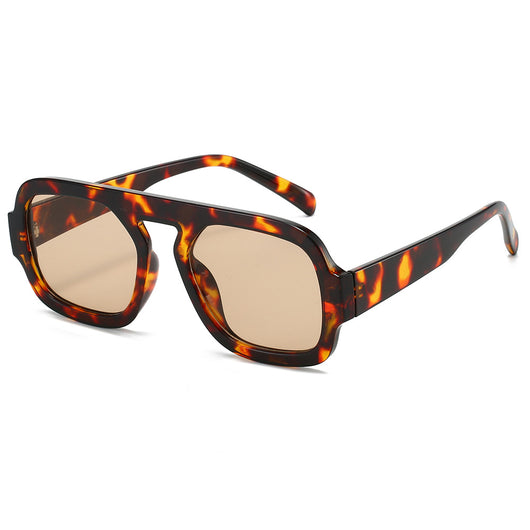 Men's and women's pilot sunglasses with a black plastic frame and vibrant orange-yellow lenses. - Image 3