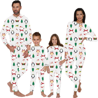 Family of four wearing matching white Christmas pajamas with Santa, penguin, reindeer, and tree print. - Image 11