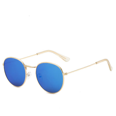 Round gold-framed sunglasses with pink tinted lenses, featuring clear temple tips. - Image 30