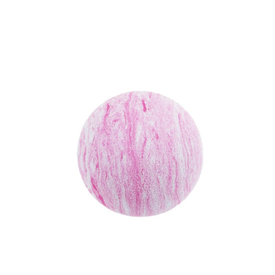 Black and white marbled EVA foam ball, a pet toy, on a white background with blurred flowers. - Image 14