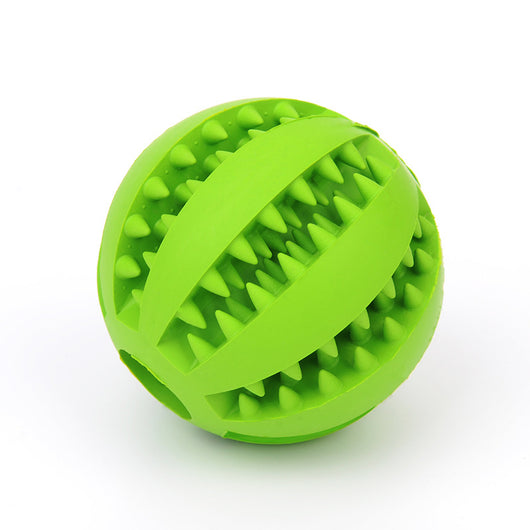 Bright green rubber pet toy ball with textured spikes and ridges for dental cleaning and food dispensing. - Image 6