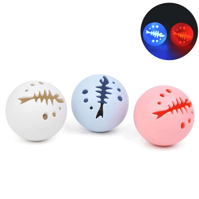Three-pack of cat toy balls, including a pink fishbone-patterned ball, a mint ball, and a flashing ball. - Image 2