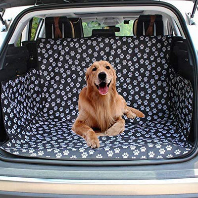 Black waterproof pet car mat with white paw print pattern covering the trunk and back of seats in an SUV. - Image 3