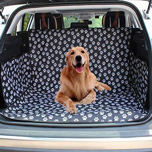 Black waterproof pet car mat with white paw print pattern covering the trunk and back of seats in an SUV. - Image 3