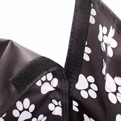 Black waterproof pet car mat with white paw print pattern covering the trunk and back of seats in an SUV. - Image 4