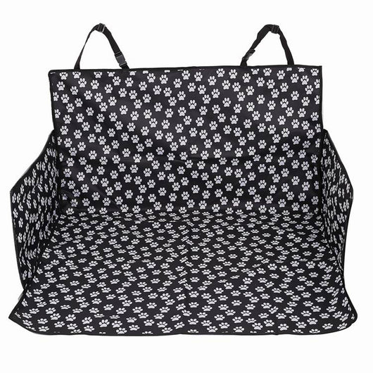 Black waterproof pet car mat with white paw print pattern covering the trunk and back of seats in an SUV. - Image 6