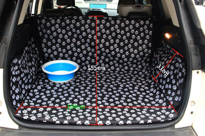 Black waterproof pet car mat with white paw print pattern covering the trunk and back of seats in an SUV. - Image 7