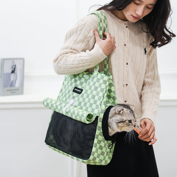 Blue and gray checkered soft pet carrier bag with mesh window and side opening for small cats or dogs.