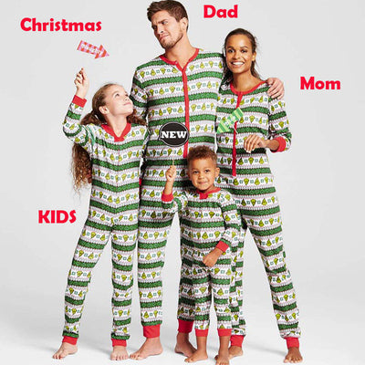 Family of four wearing matching green, white, and red striped Christmas long-sleeve pajama jumpsuits. - Image 13