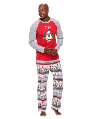 Woman wearing a grey and red 'Mama Bear' Christmas pajama set with a polar bear graphic and fair isle patterned pants. - Image 6
