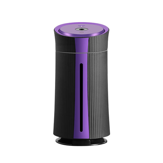 Black and purple columnar mini USB humidifier with ribbed texture and visible water level indicator.