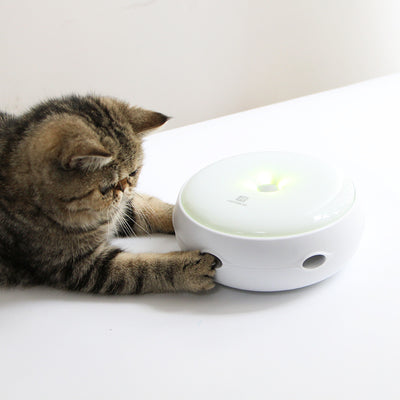 White electric cat toy with a colorful feather attachment and four AA batteries for interactive pet play. - Image 9