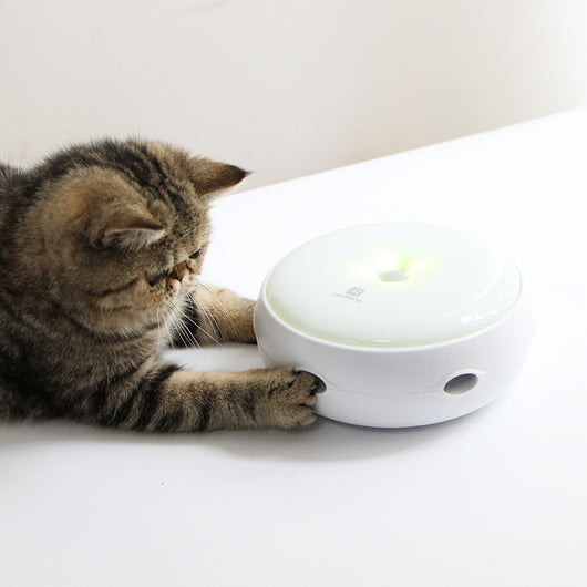 White electric cat toy with a colorful feather attachment and four AA batteries for interactive pet play. - Image 9