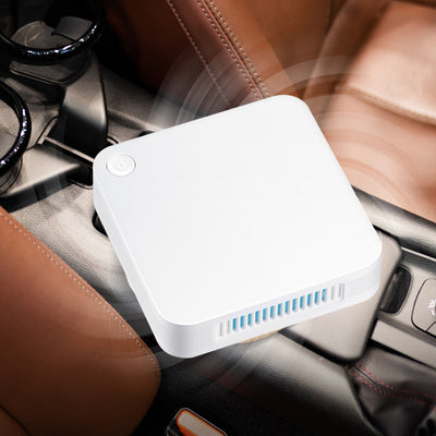White square household car sterilizer purifier with a power button and blue-lit ventilation slots. - Image 3