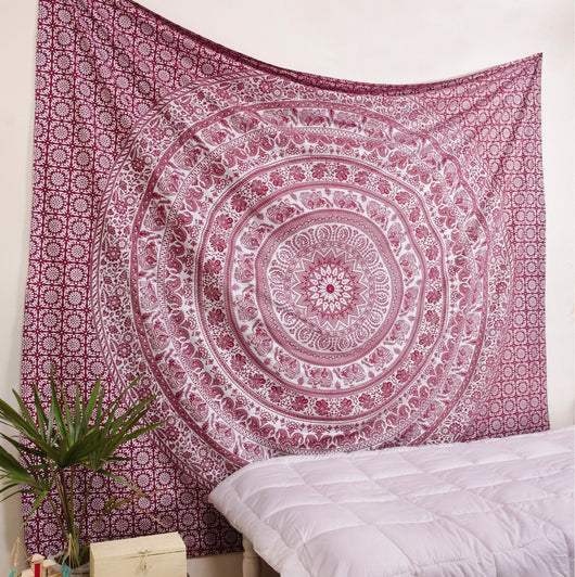 Gold and blue mandala tapestry with elephant and floral patterns, hung above a white quilted bed. - Image 7
