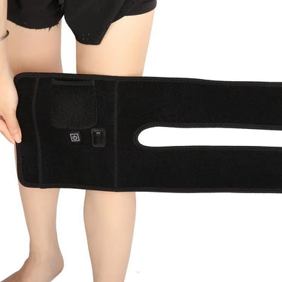 Black electric heating knee pad with power and temperature controls, designed for warmth and physical therapy. - Image 4