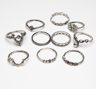 Juego de 10 Anillos de Diamante Púrpura con Diseño Hueco Retorcido y Corona - Image 4