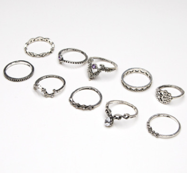 Juego de 10 Anillos de Diamante Púrpura con Diseño Hueco Retorcido y Corona - Image 5