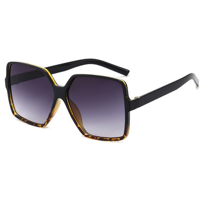 Trendy oversized sunglasses with black and tortoiseshell frames and gradient grey lenses, angled on a white background. - Image 8