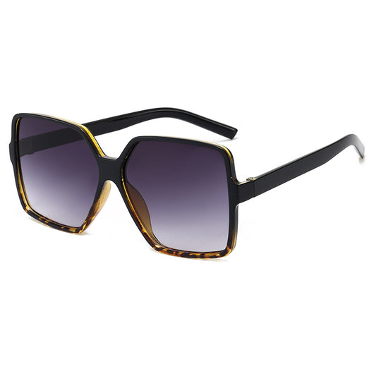 Trendy oversized sunglasses with black and tortoiseshell frames and gradient grey lenses, angled on a white background. - Image 8