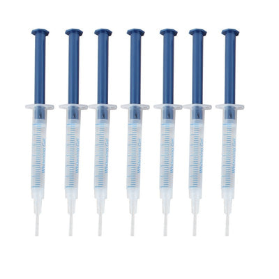 Teeth whitening kit with a blue LED light mouthpiece and a syringe of whitening gel on a white background. - Image 4