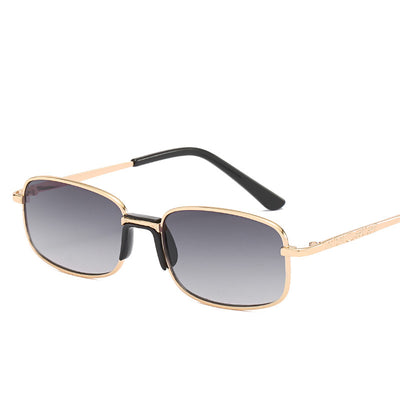 Vintage gold-colored metal frame sunglasses with light blue rectangular lenses and black temple tips. - Image 3