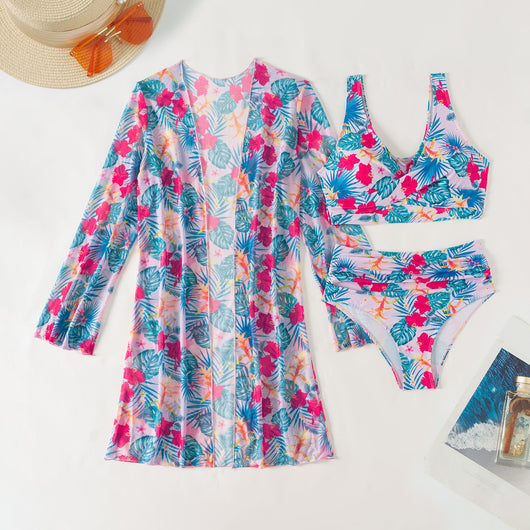 Multicolor tropical print three-piece swimsuit set with high-waisted bikini and sheer mesh cover-up on a beach. - Image 29