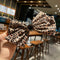 Moño Estampado Leopardo con Strass para el Cabello