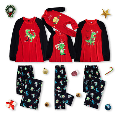 Family matching Christmas pajamas: black long-sleeve tops with white deer prints and red buffalo plaid pants. - Image 8