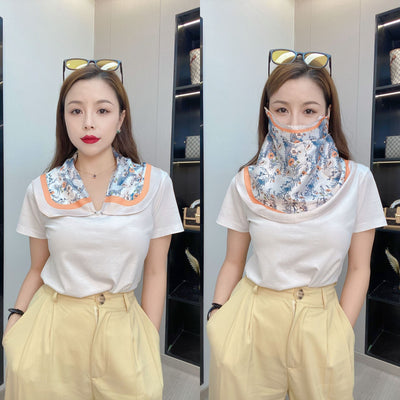 Female cream and black floral polka dot sun protection mask with ear loops, designed for eye corner protection. - Image 11