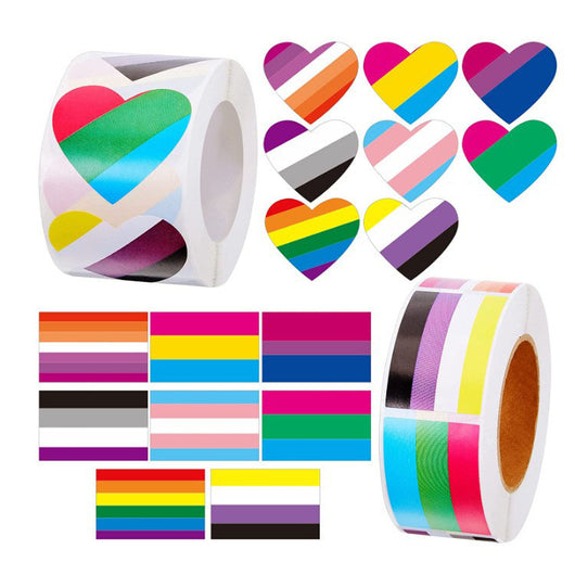 Roll of heart-shaped stickers featuring the Progress Pride flag design with rainbow and chevron stripes. - Image 10