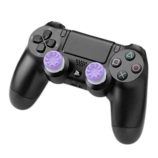 Two black ABS thumb grip extenders for PlayStation 4 controllers, featuring a textured surface for enhanced grip. - Image 2